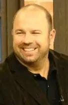 Candid smiling portrait of Ken Wisnefski